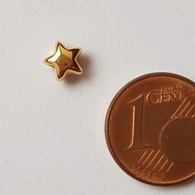 DQ Metallperle mini Stern goldfarben